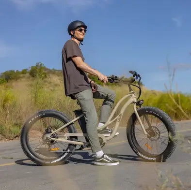 A man riding his fat tyre electric bike in rural Australia.